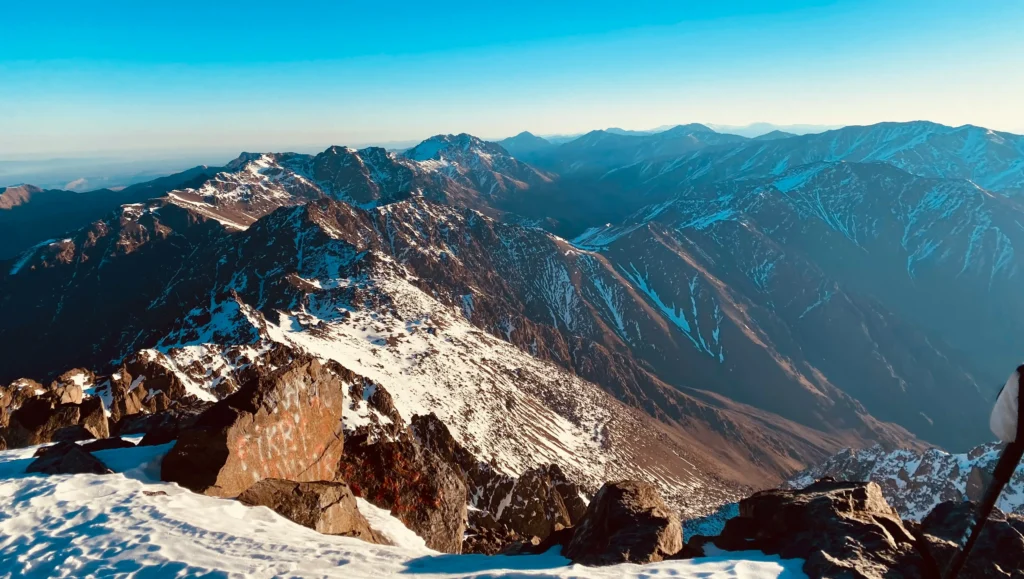 Berber village in High Atlas Mountains with snowy peaks